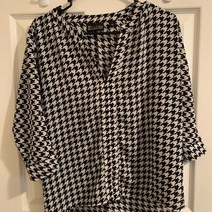 Black and white blouse with V-neck